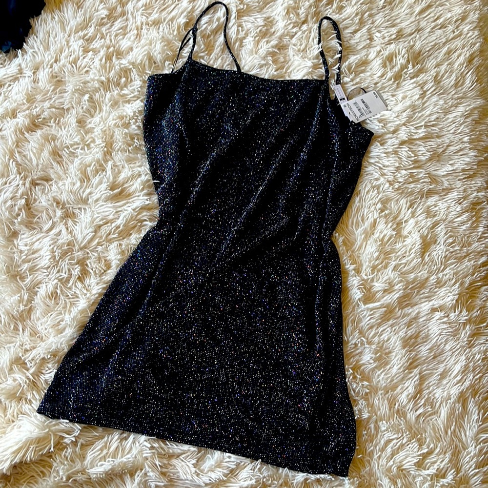 Never worn! Nice form fitting mini dress